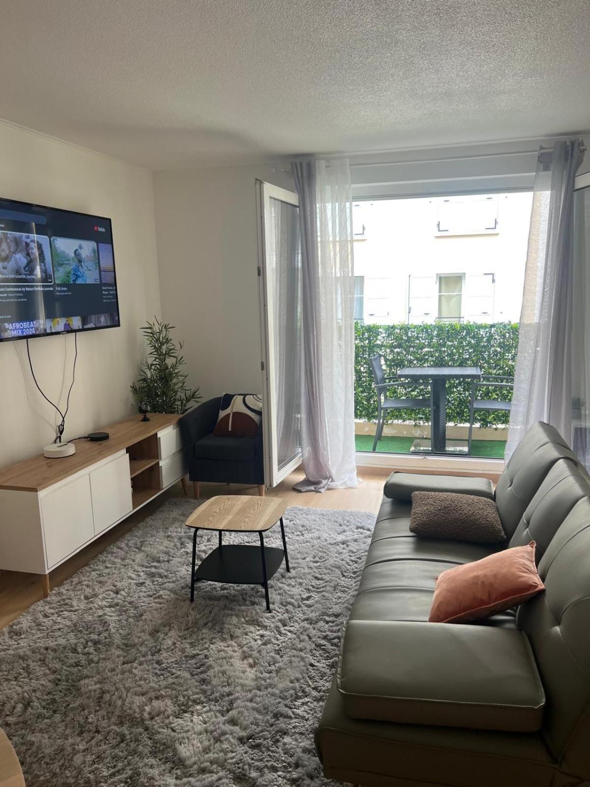 Champion Suites Sarcelles Quarto foto